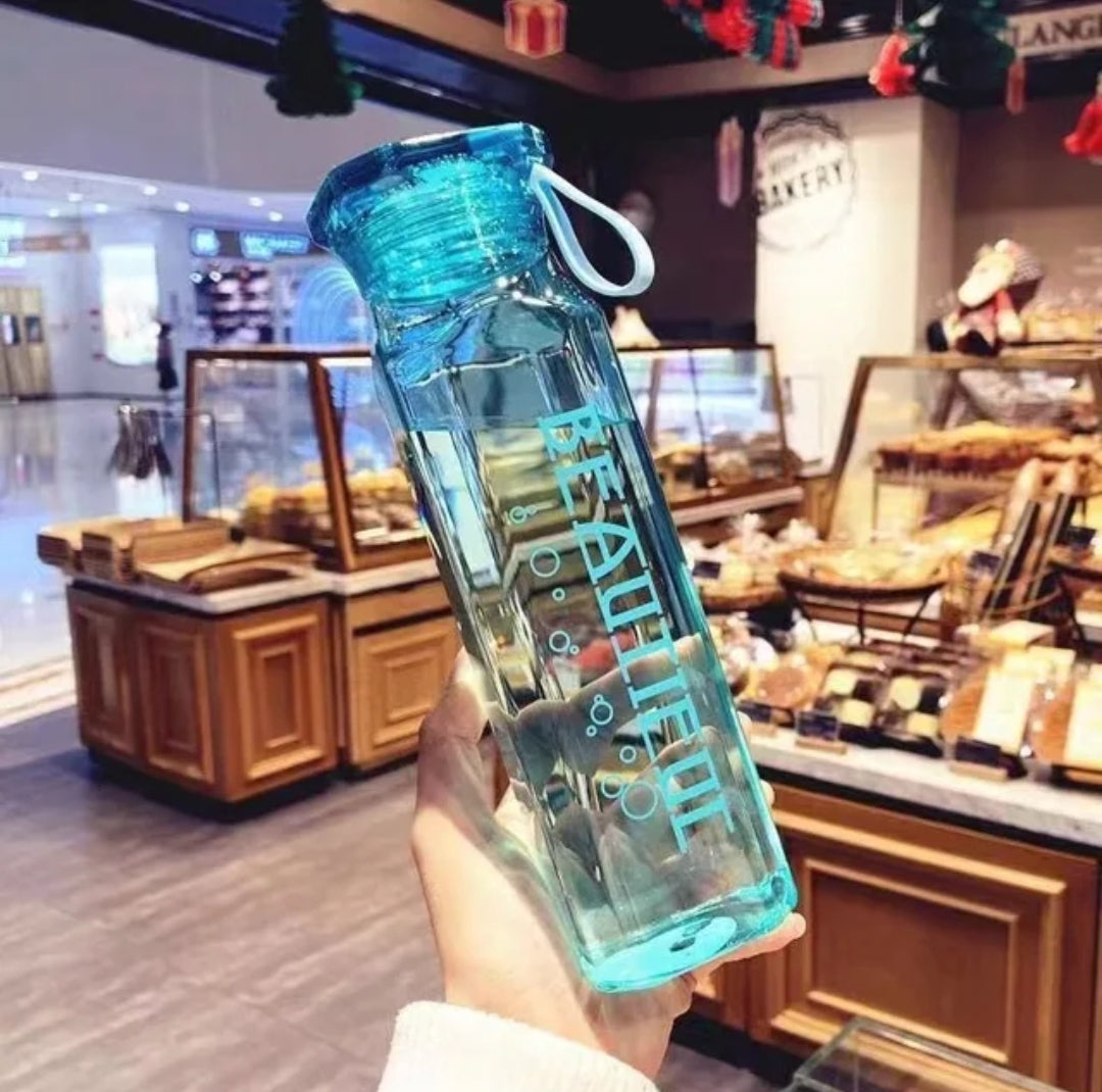 Glass water bottle with strap pouch